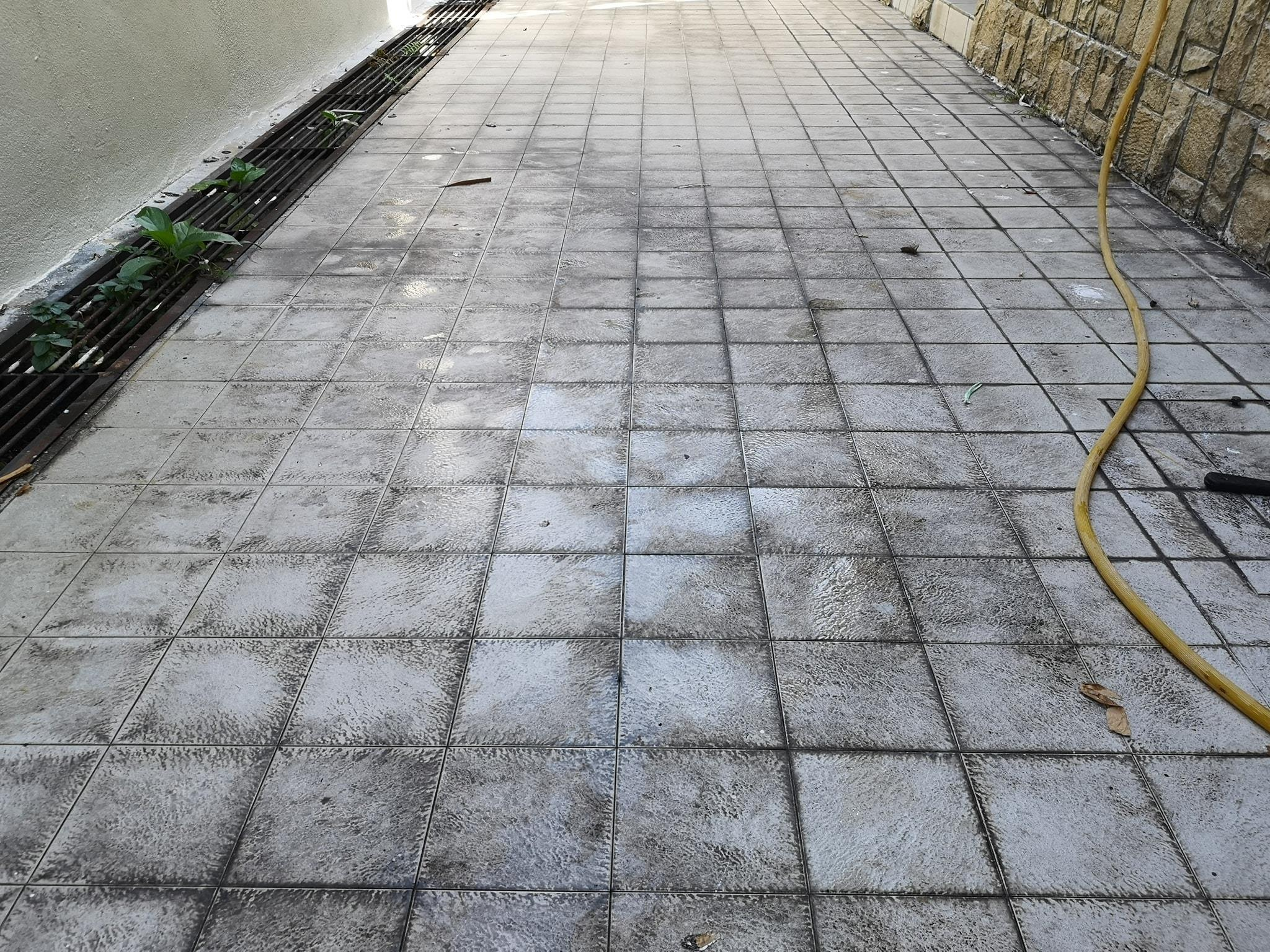 Dirty, stained floor before restoration