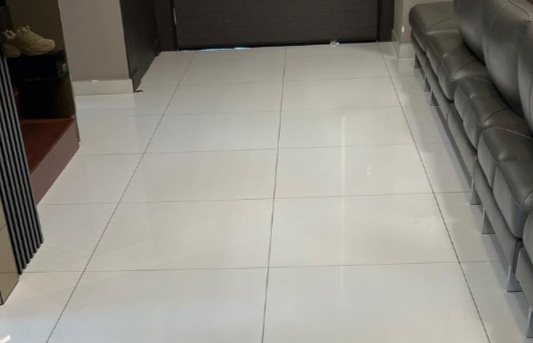 Tiles before regrouting – stained grout lines